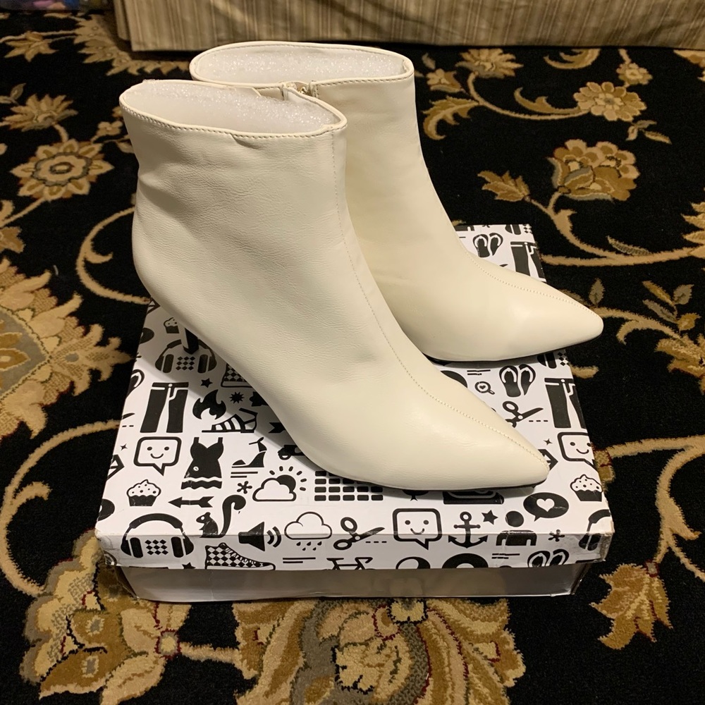 White faux leather pointy toe booties